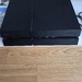 PlayStation 4 (500GB, schwarz) und Controller - Bild 1